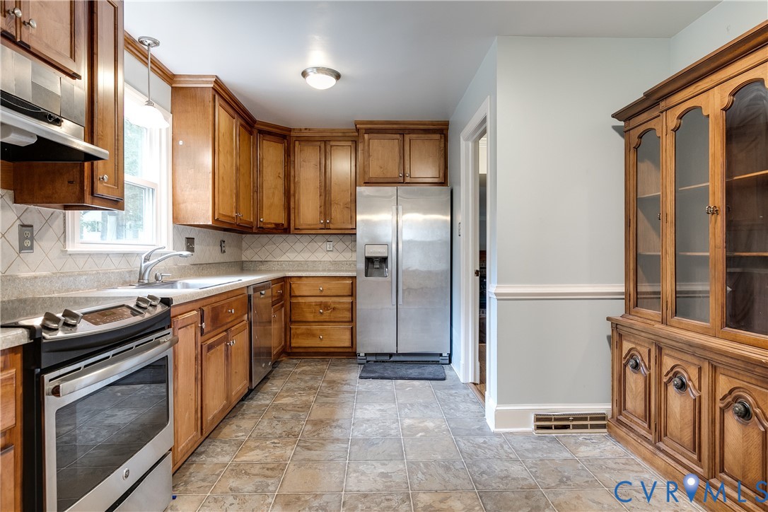 3924 Belspring Road Chester, VA 23831 - Photo 13 of 36 Kitchen featuring wood cabinetry, stainless steel