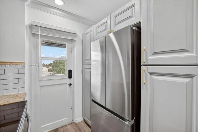 a view of a park with palm trees