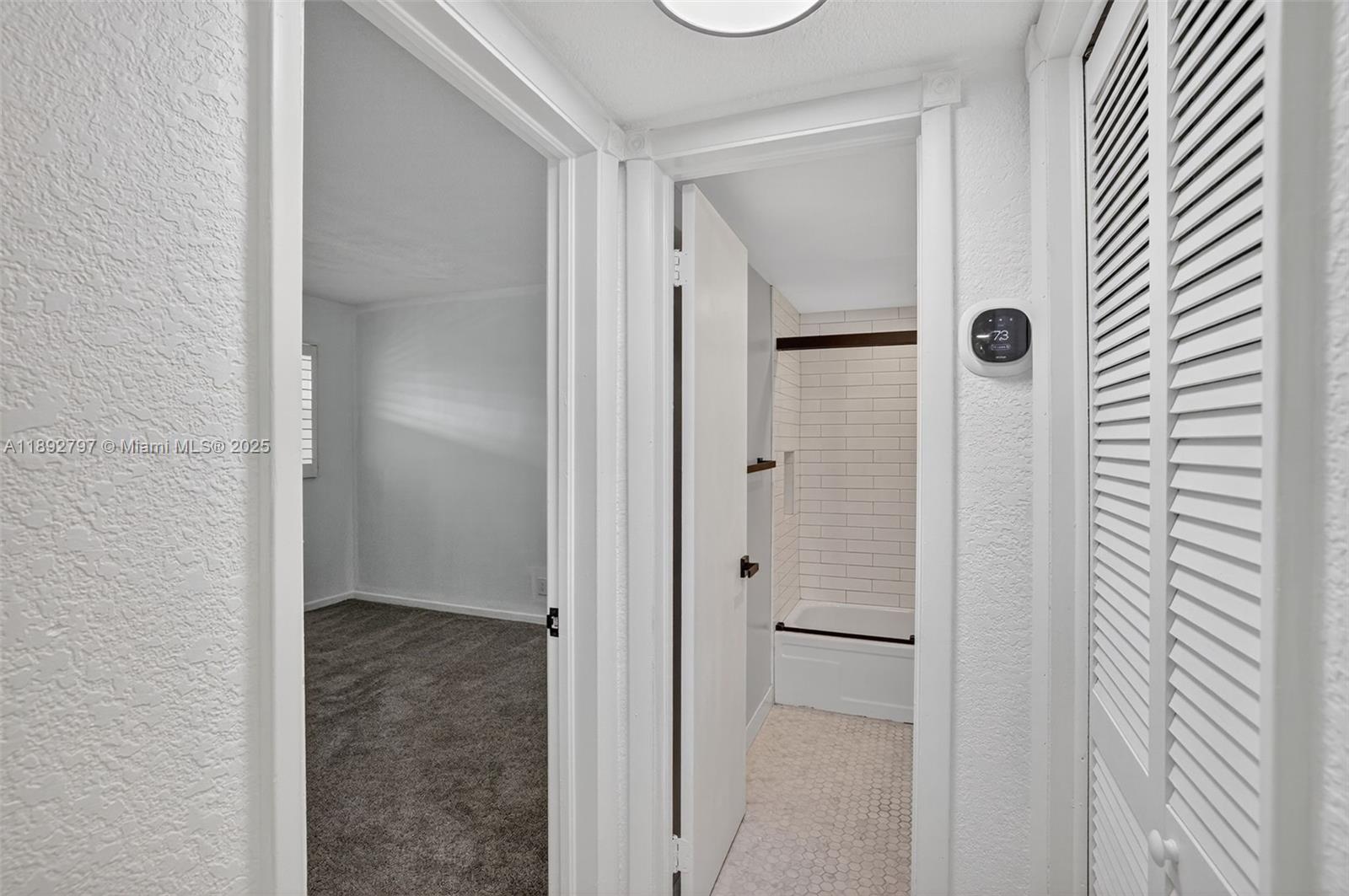 900 Southwest 12th Street, Unit 305 Fort Lauderdale, FL 33315 - Photo 38 of 72 View toward guest bathroom and guest bedroom