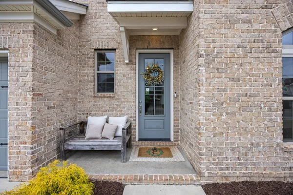 a front view of a house with a couch