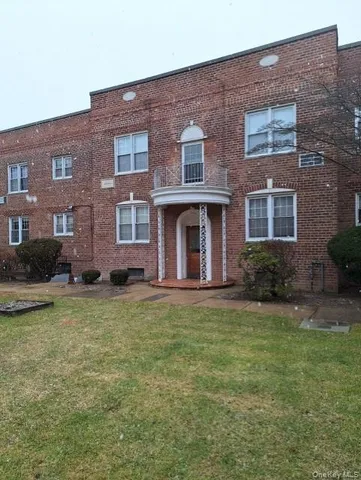 a house view with a garden space