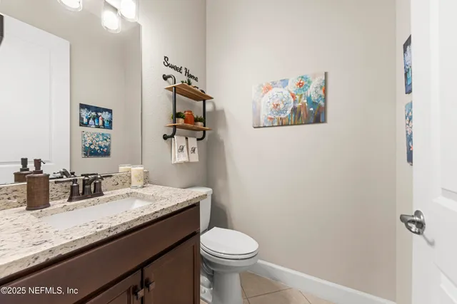 a bedroom with two beds and a window