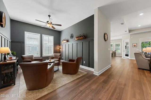 a living room with furniture and a window