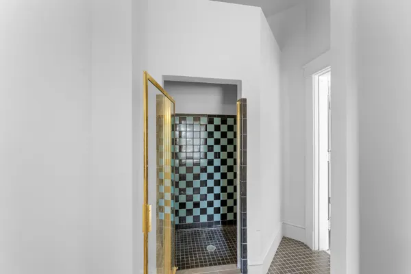 a bathroom with a sink and a washing machine