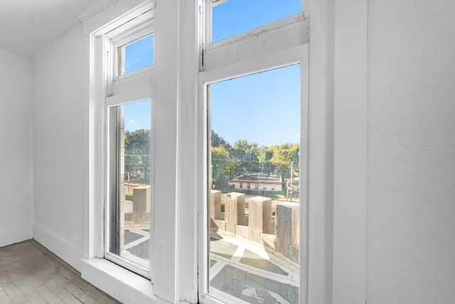 a bathroom with a bathtub and shower