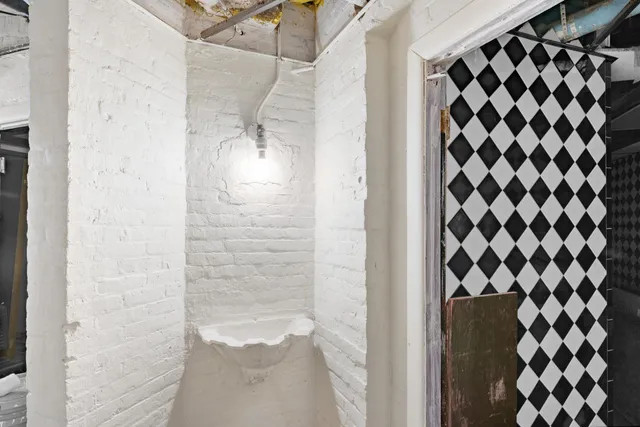 a room with furniture and a window