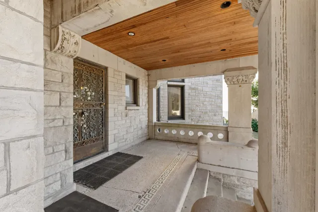 a view of balcony with patio