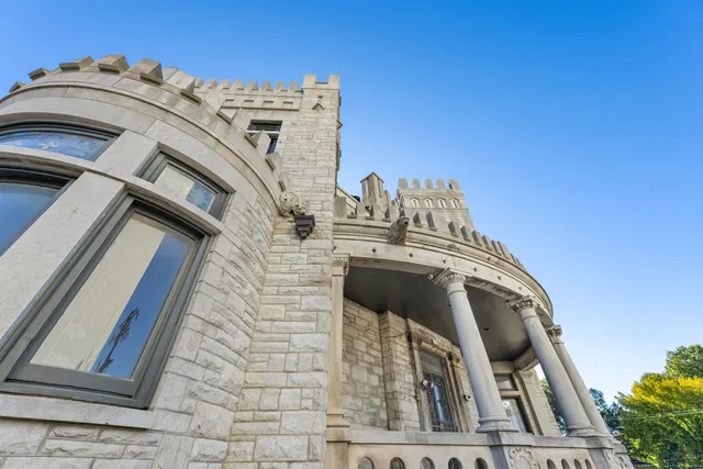 front view of a building with a small yard