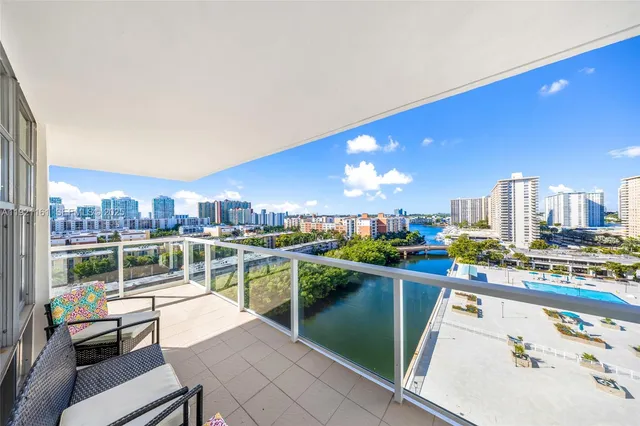 a reading room with furniture and a book shelf