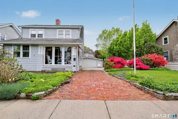 a front view of house with yard