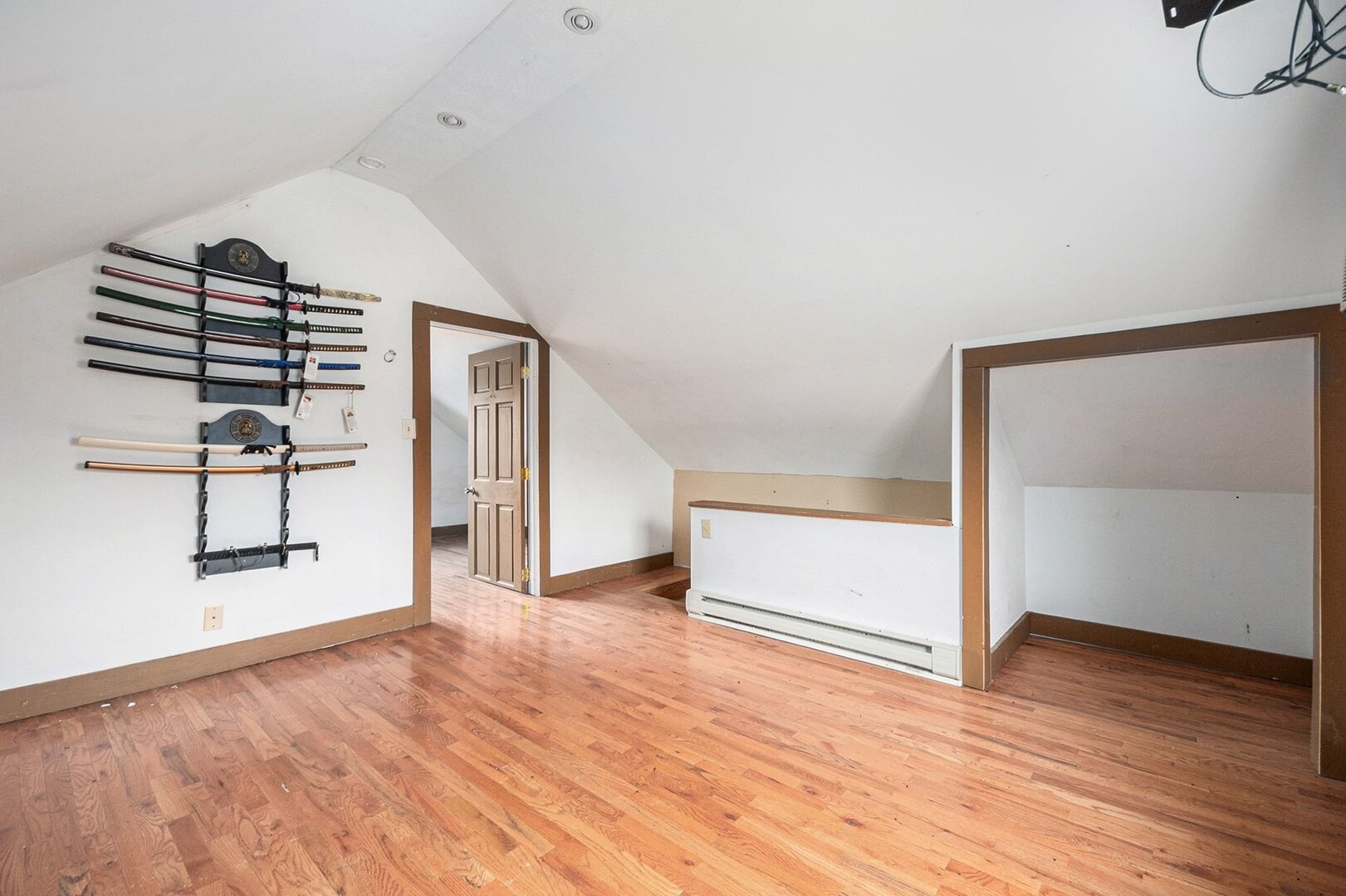 265 Monroe Street Gardner, IL 60424 - Photo 21 of 25 an empty room with wooden floor and windows