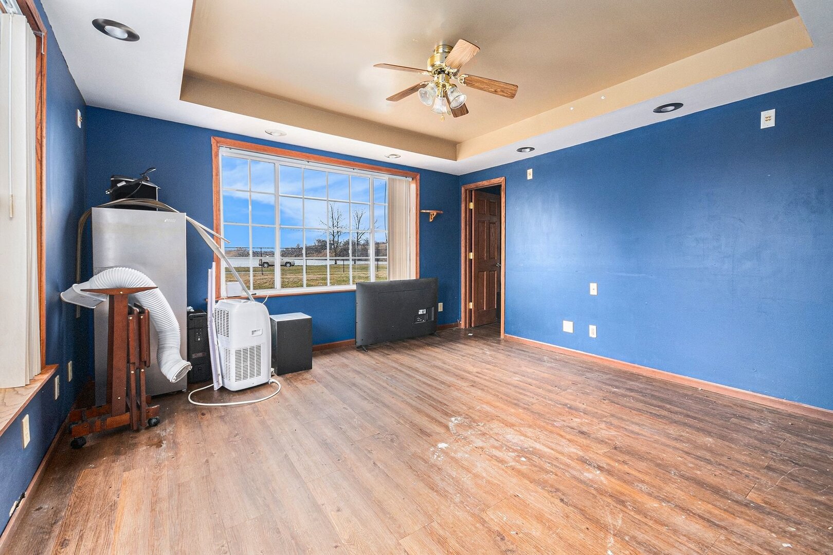 265 Monroe Street Gardner, IL 60424 - Photo 8 of 25 a view of a livingroom with furniture and chandelier fan