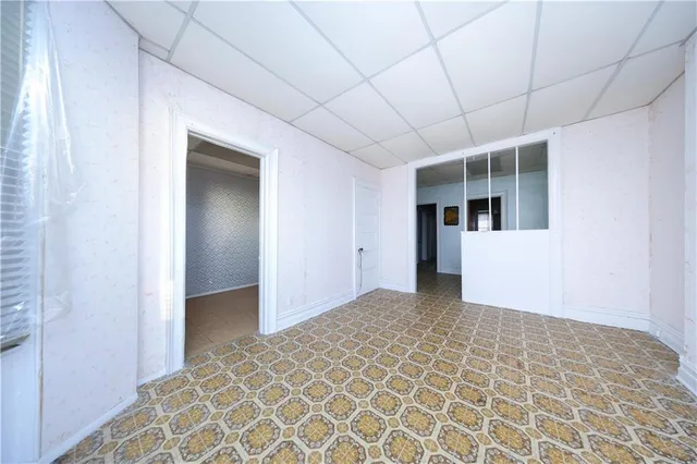 a view of a hallway with a chandelier