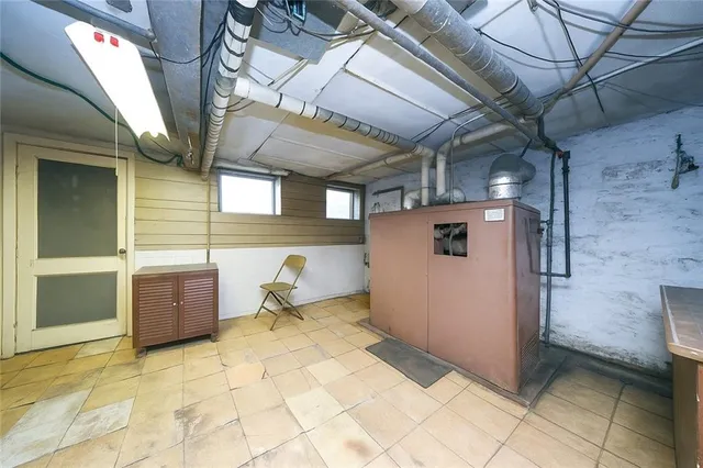 a view of a chair and table in backyard