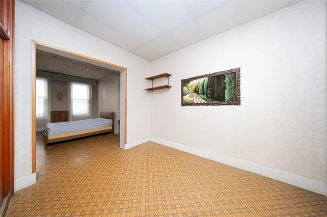 a view of a bedroom with window