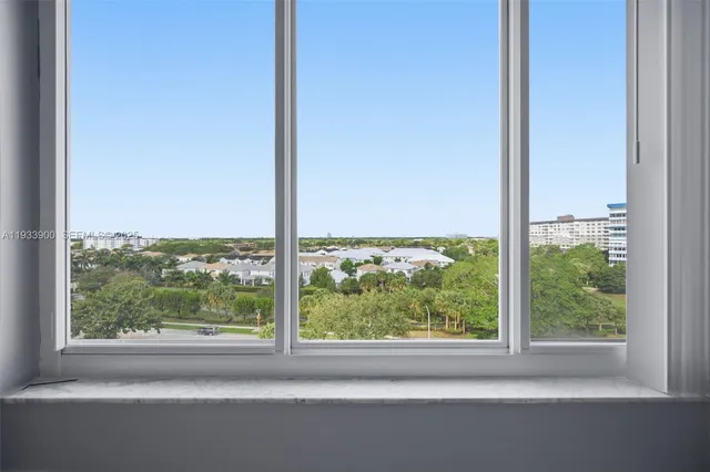 a view of a room that has a window