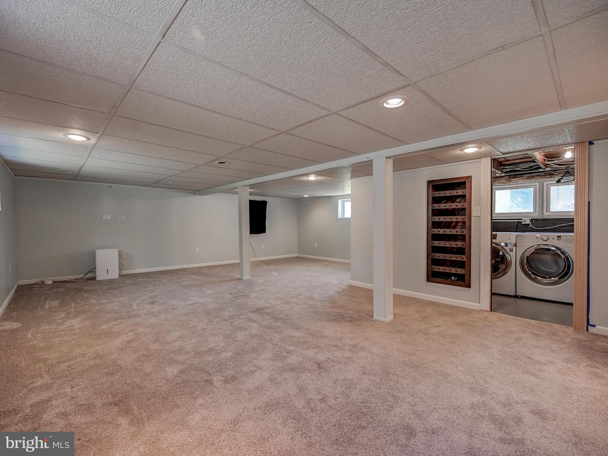 2512 Barrison Point Road Baltimore, MD 21221 - Photo 23 of 44 Spacious Family Room and Laundry in lower level