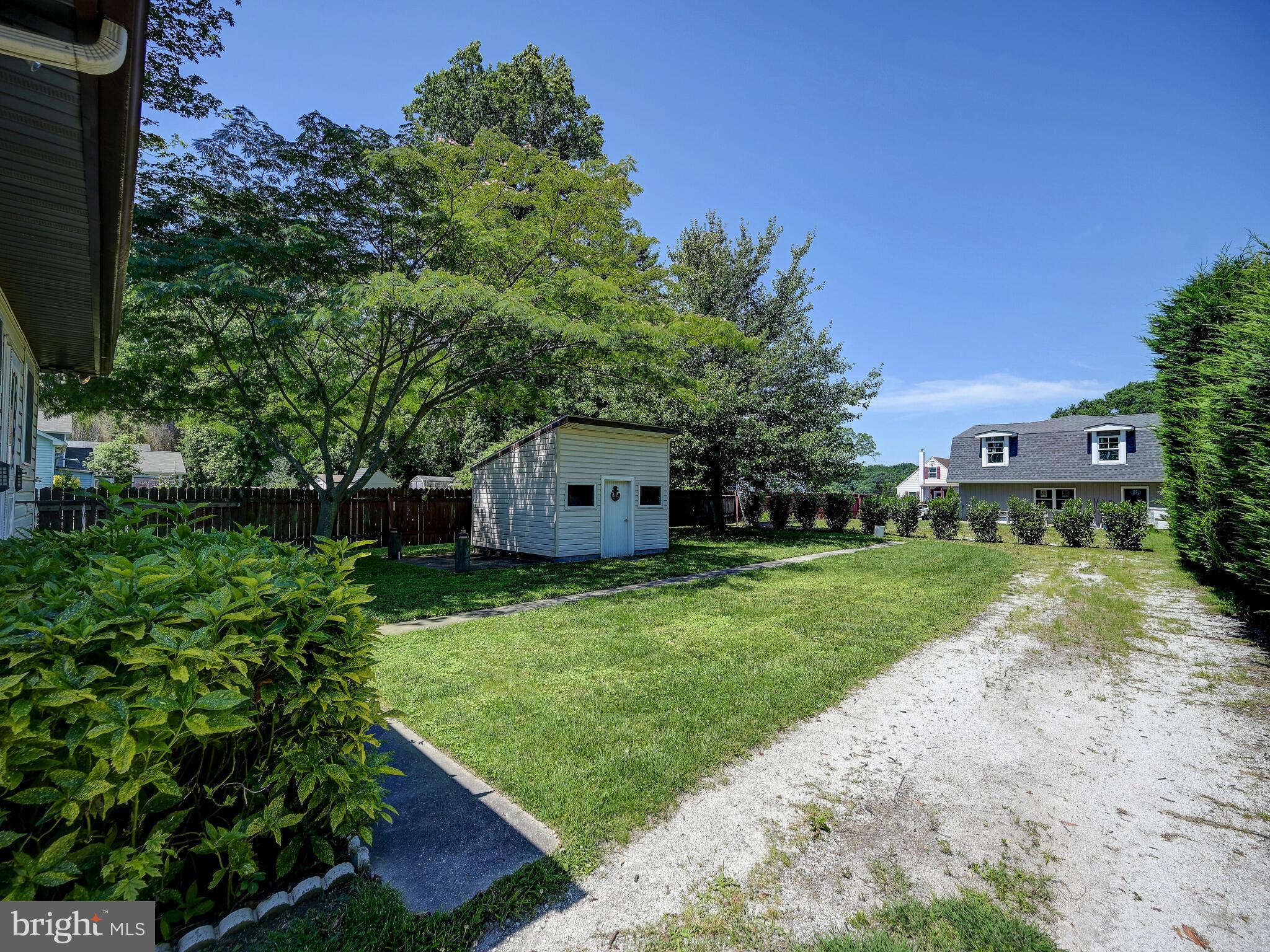 2512 Barrison Point Road Baltimore, MD 21221 - Photo 34 of 44 Big yard with storage shed
