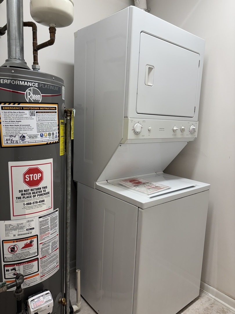 3303 Grove Avenue, Unit 310 Berwyn, IL 60402 - Photo 17 of 21 a utility room with washer and dryer