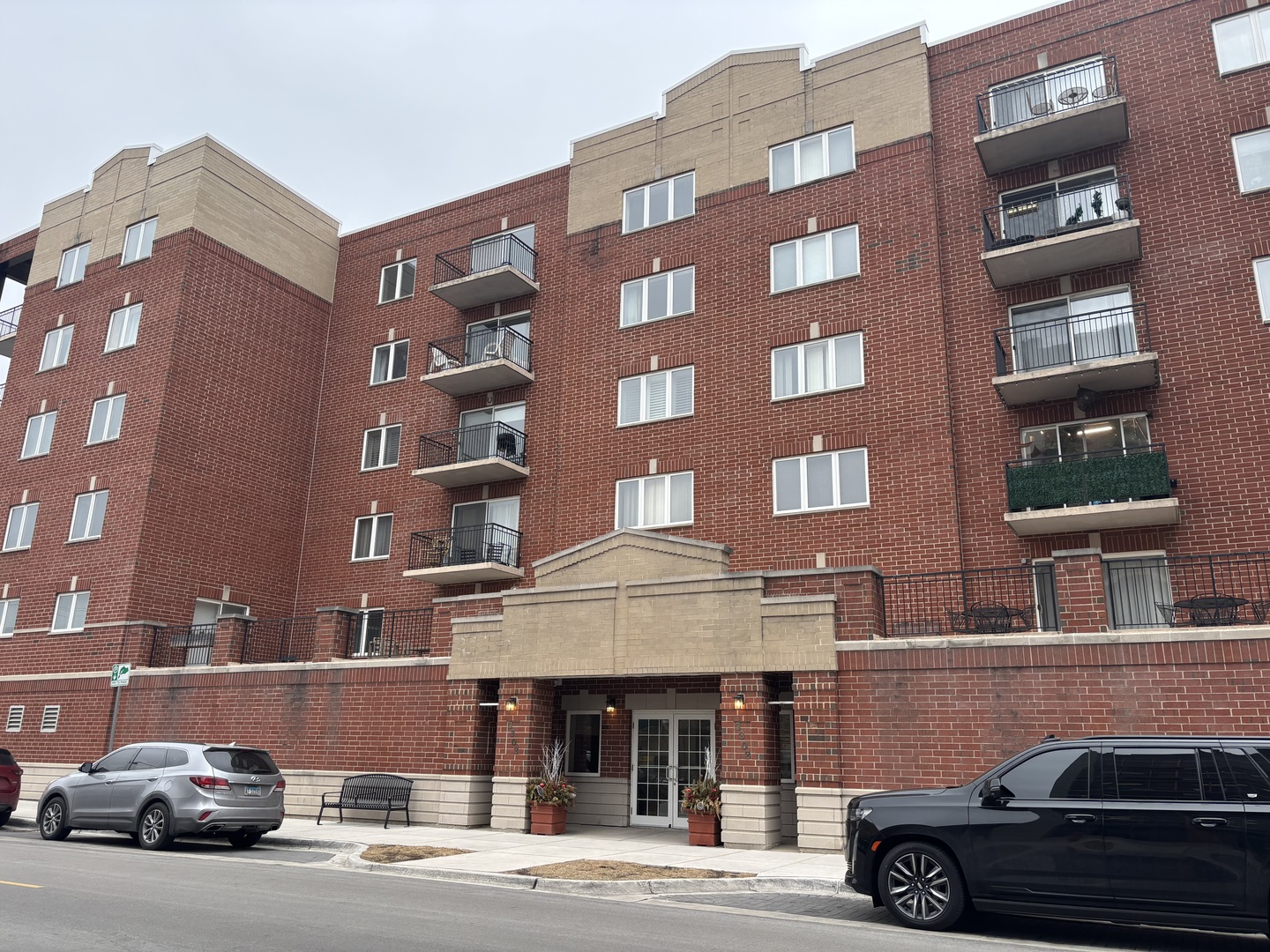 3303 Grove Avenue, Unit 310 Berwyn, IL 60402 - Photo 2 of 21 a car parked in front of a building