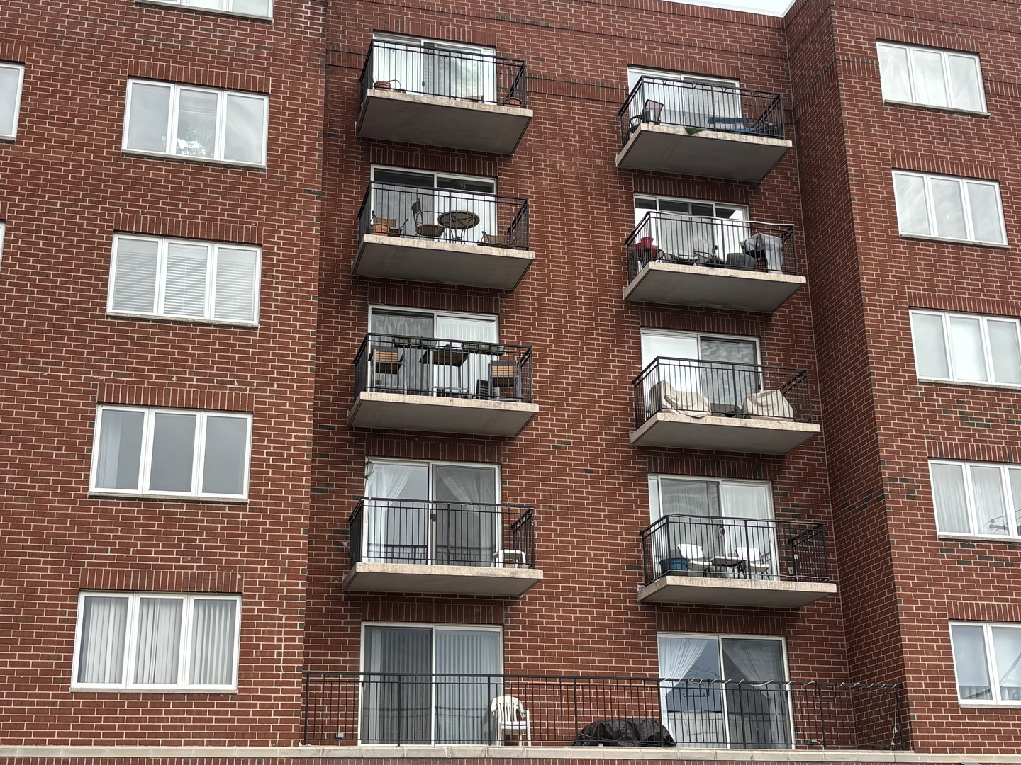 3303 Grove Avenue, Unit 310 Berwyn, IL 60402 - Photo 21 of 21 a building view with a lot of windows