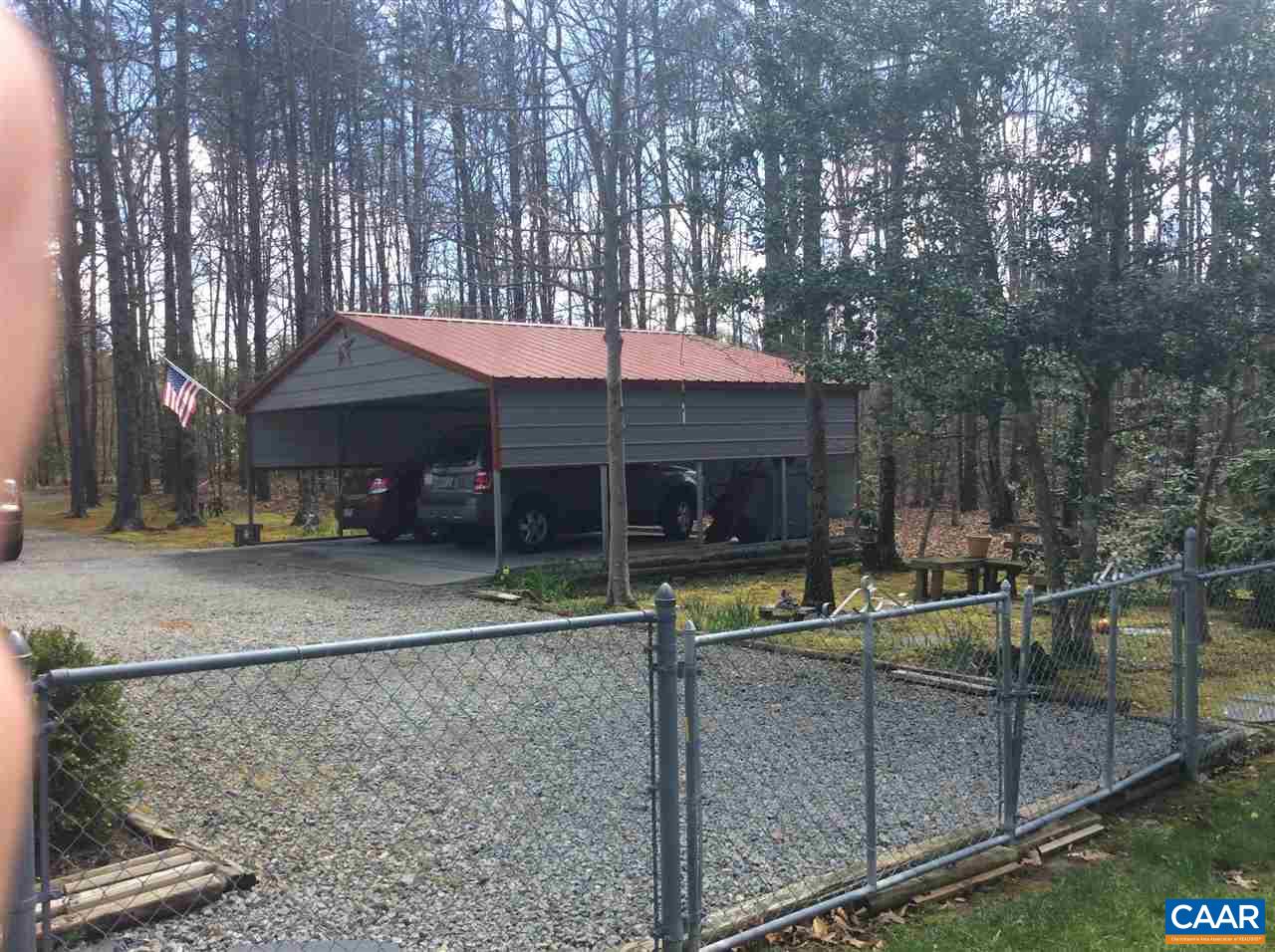 1637 Buckner Road Bumpass, VA 23024 - Photo 12 of 14 a view of a house with pool and chairs