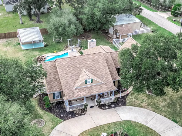 an aerial view of a house having yard