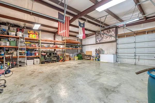 a view of a garage with storage