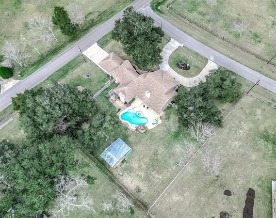 a view of a back yard of a house