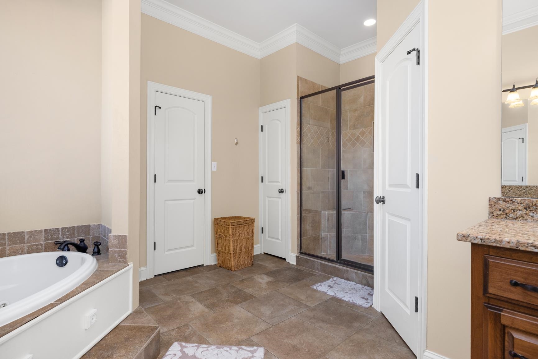 104 Eagle Trace Road Covington, TN 38019 - Photo 21 of 40 Full bath with ornamental molding, a bath, vanity, a stall shower, and recessed lighting