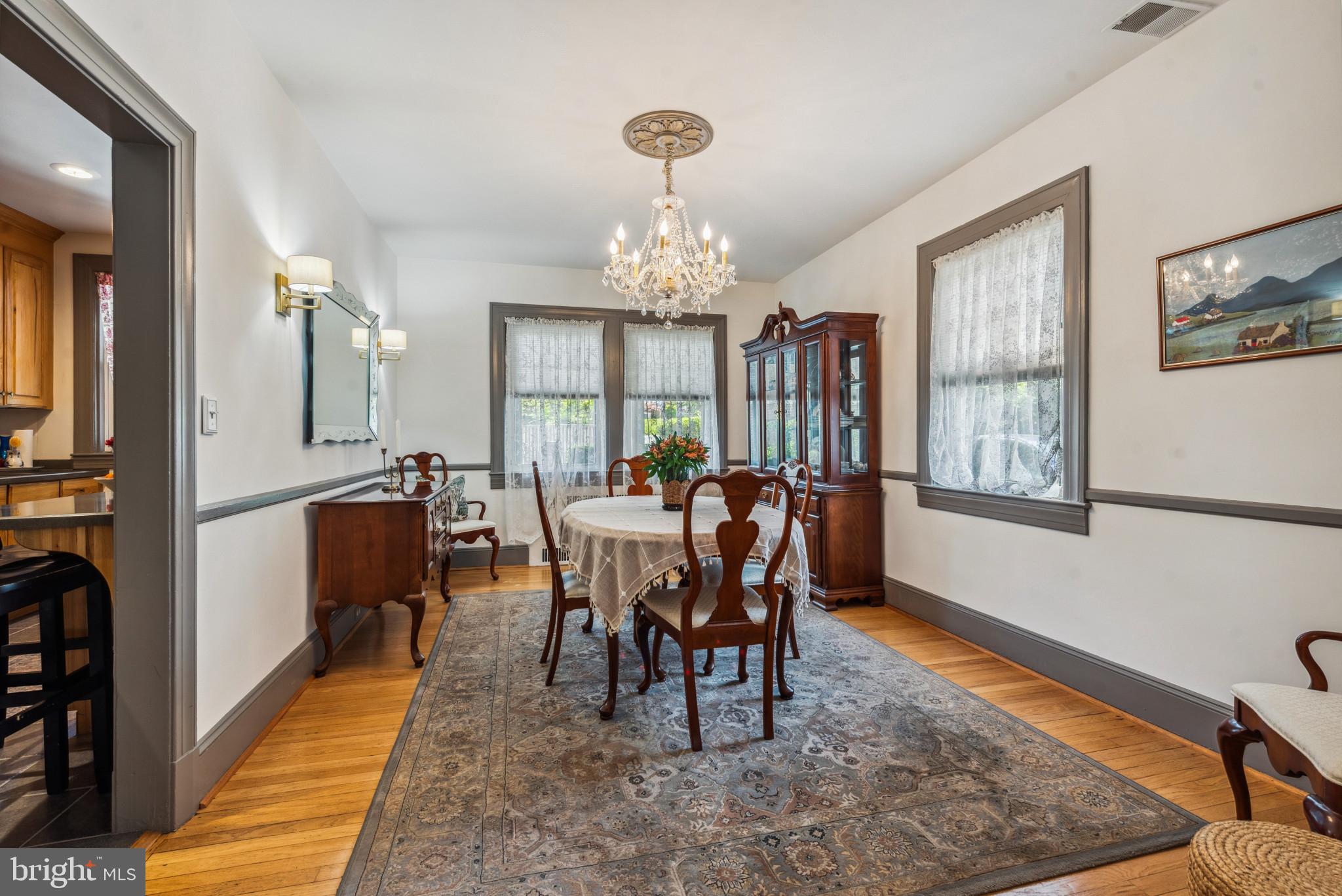 401 Hopkins Road Baltimore, MD 21212 - Photo 13 of 63 a view of a dining room with furniture window and wooden floor