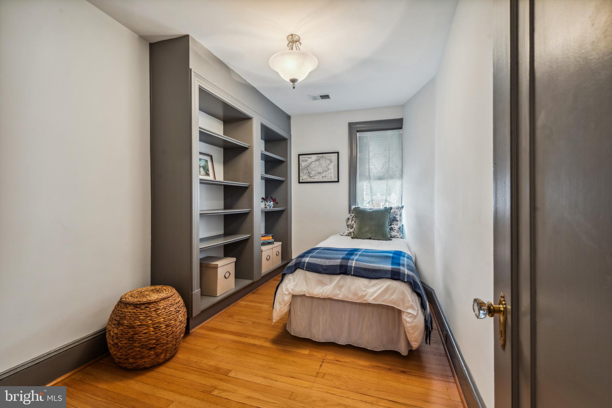 401 Hopkins Road Baltimore, MD 21212 - Photo 21 of 63 a bedroom with a bed and a window