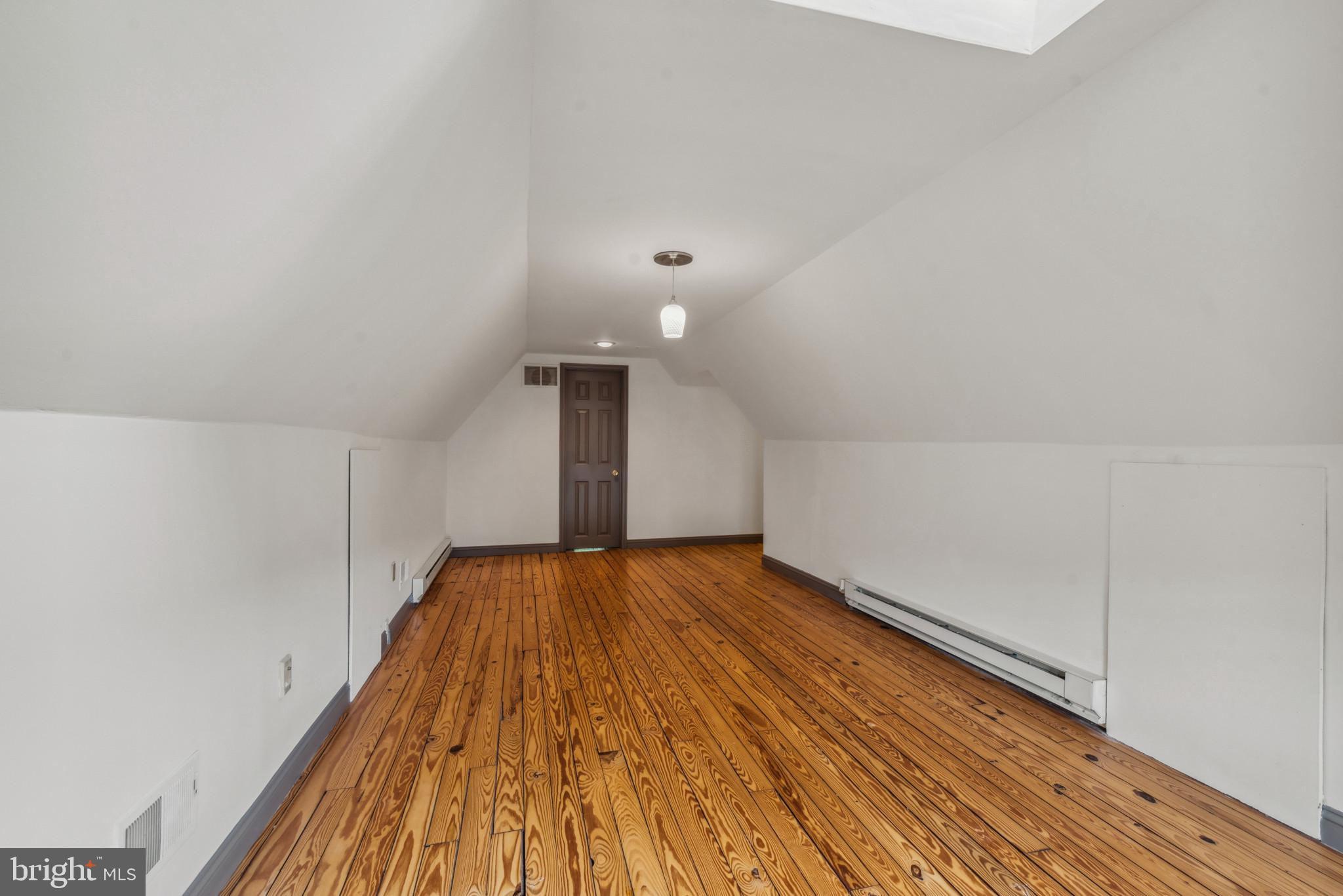 401 Hopkins Road Baltimore, MD 21212 - Photo 41 of 63 a view of empty room with wooden floor