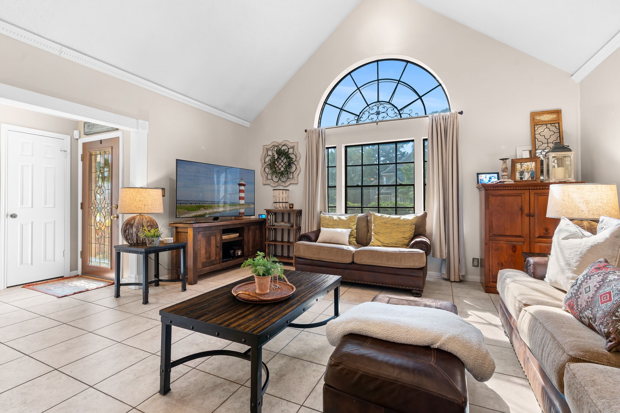 6971 Breezy Point Willis, TX 77318 - Photo 15 of 49 Family room looking back toward the entry and closet. The cathedral ceiling adds charm to this gathering area.