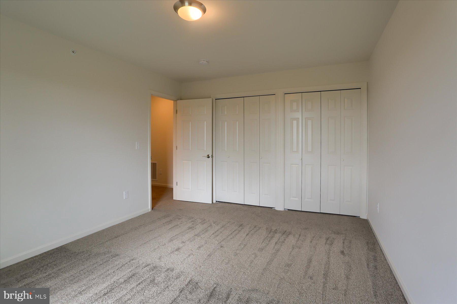 75 Cortland Crossing Palmyra, PA 17078 - Photo 14 of 21 an empty room with wooden floor and windows