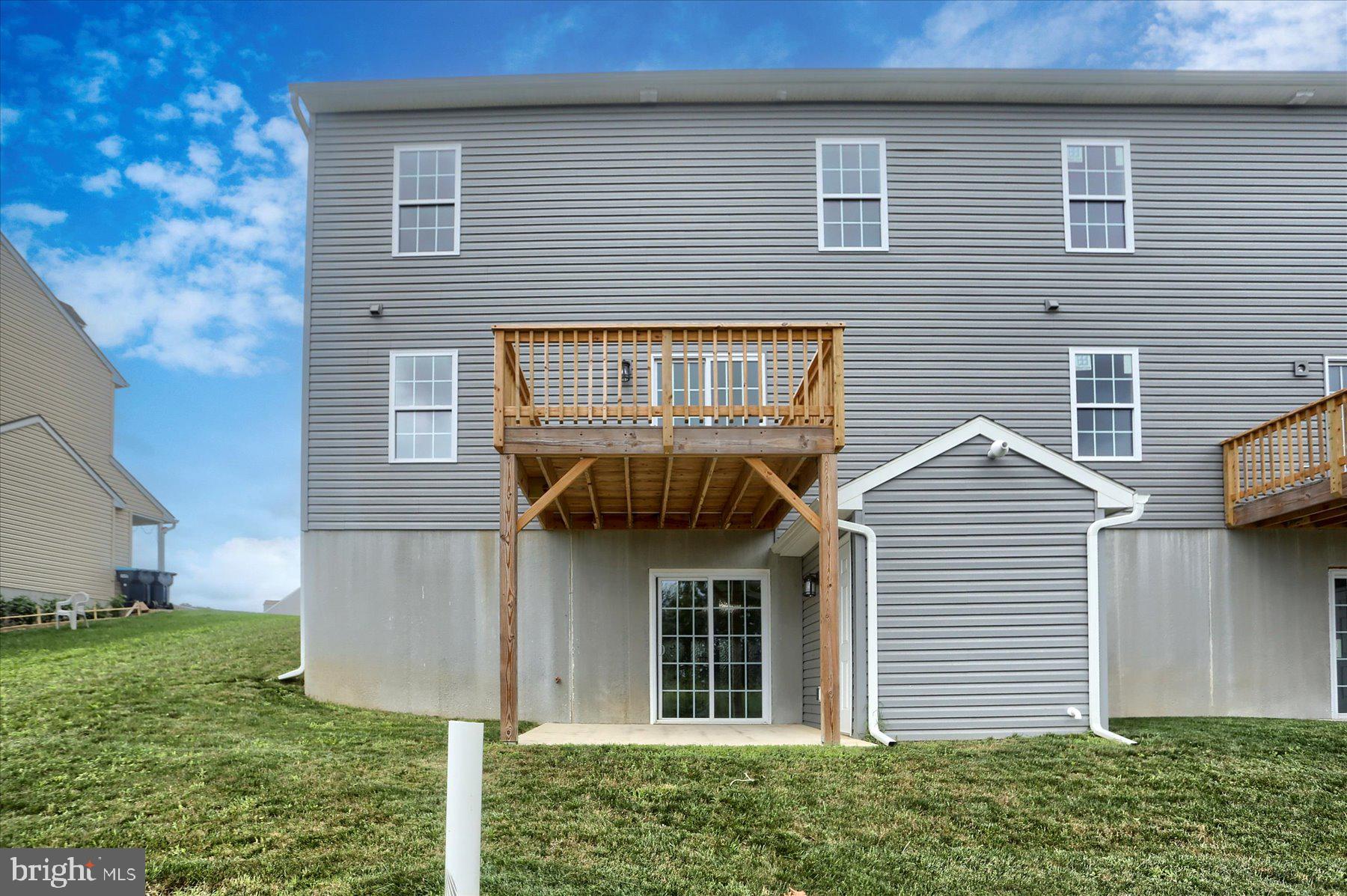 75 Cortland Crossing Palmyra, PA 17078 - Photo 21 of 21 a view of a house with brick walls and a yard