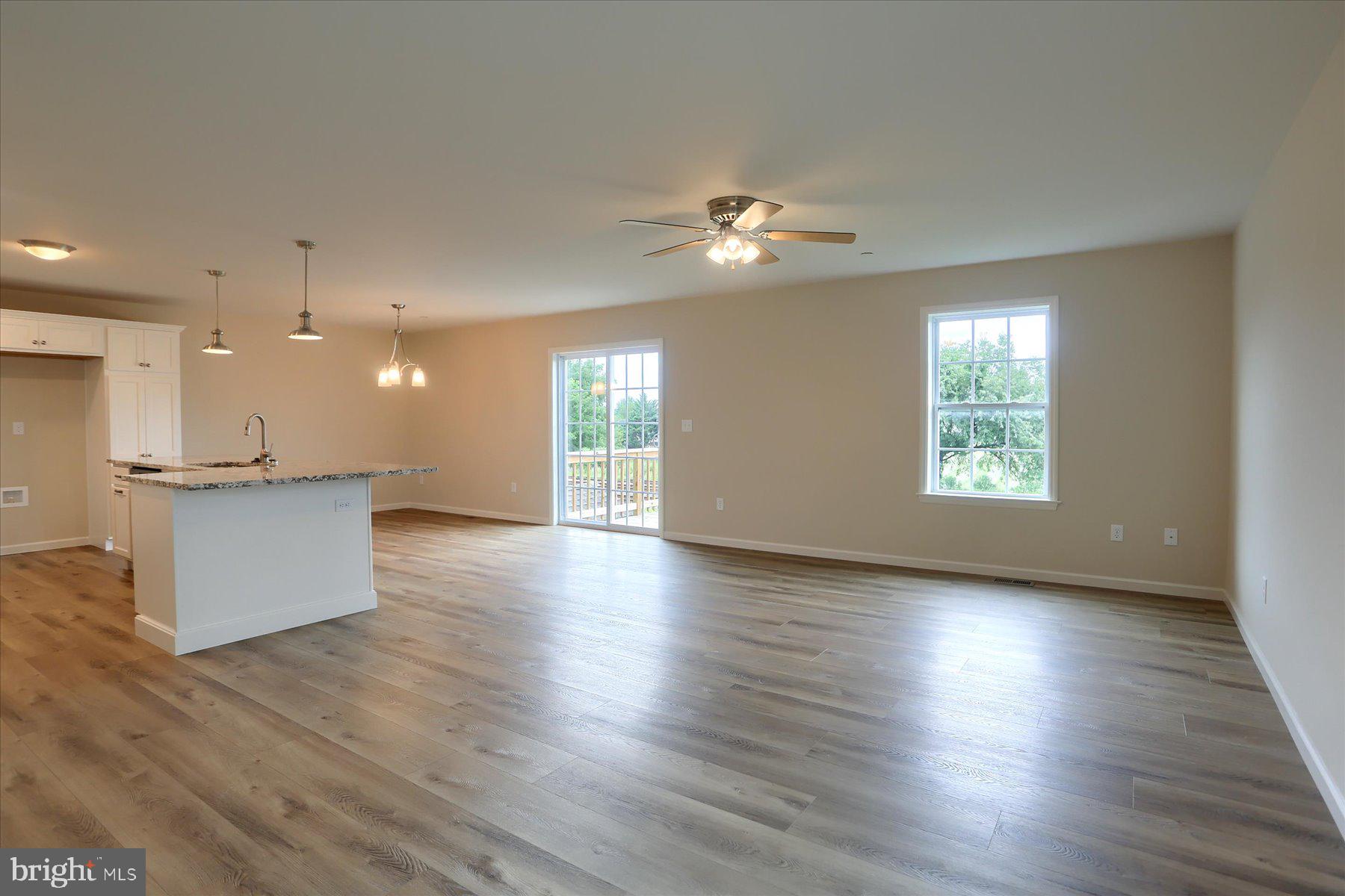 75 Cortland Crossing Palmyra, PA 17078 - Photo 8 of 21 an empty room with wooden floor and windows