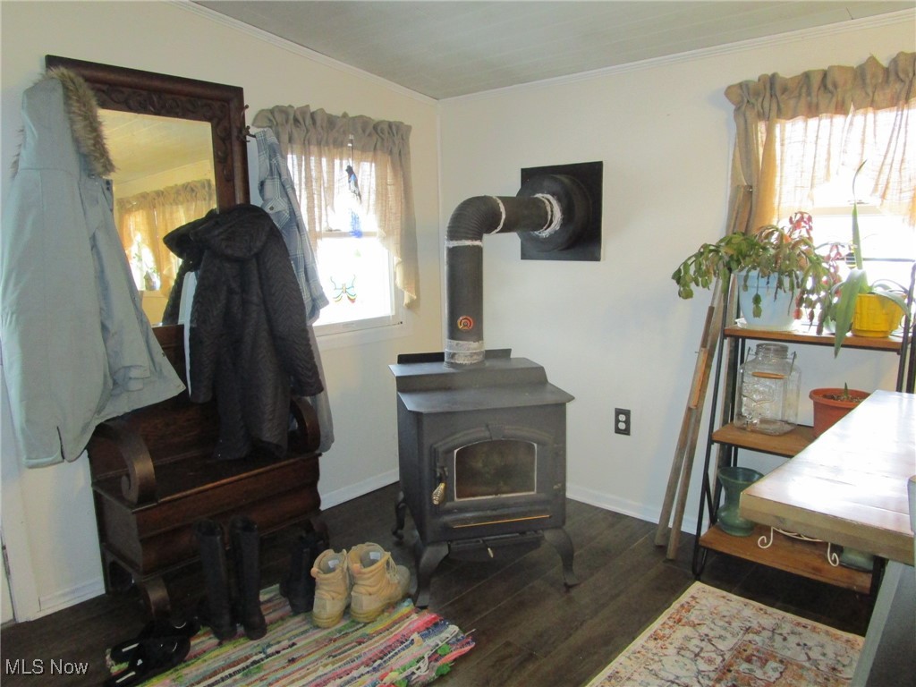 6059 Marcy Road Pierpont, OH 44082 - Photo 14 of 50 Dining area with wood burning stove