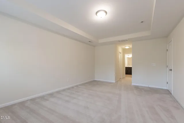 a front view of a house with basket ball court