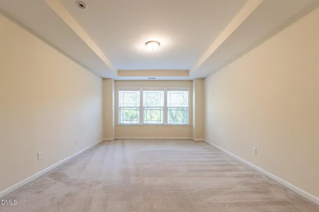 a view of a house with backyard and garden