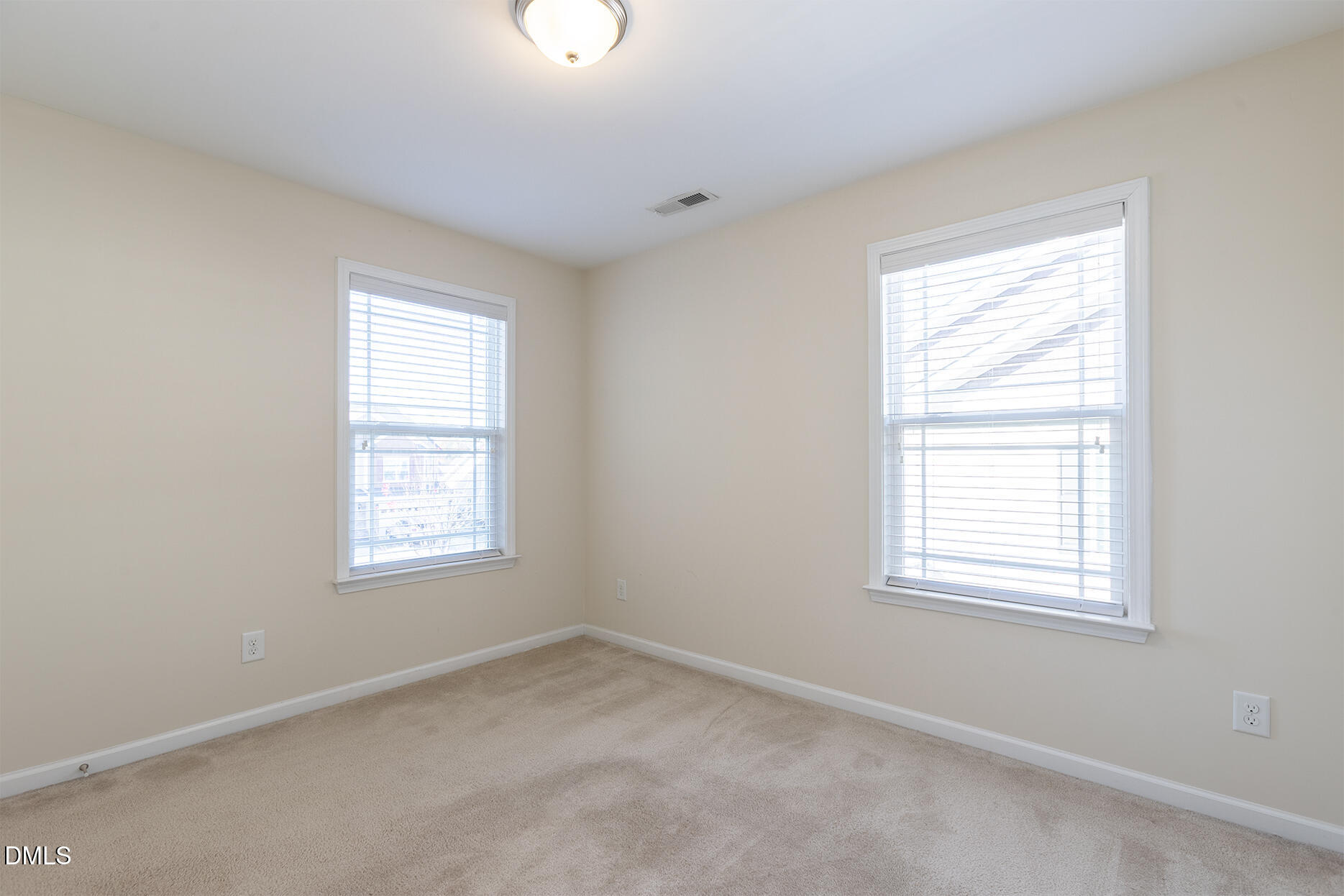 209 Mayfield Drive Apex, NC 27539 - Photo 33 of 48 an empty room with a window