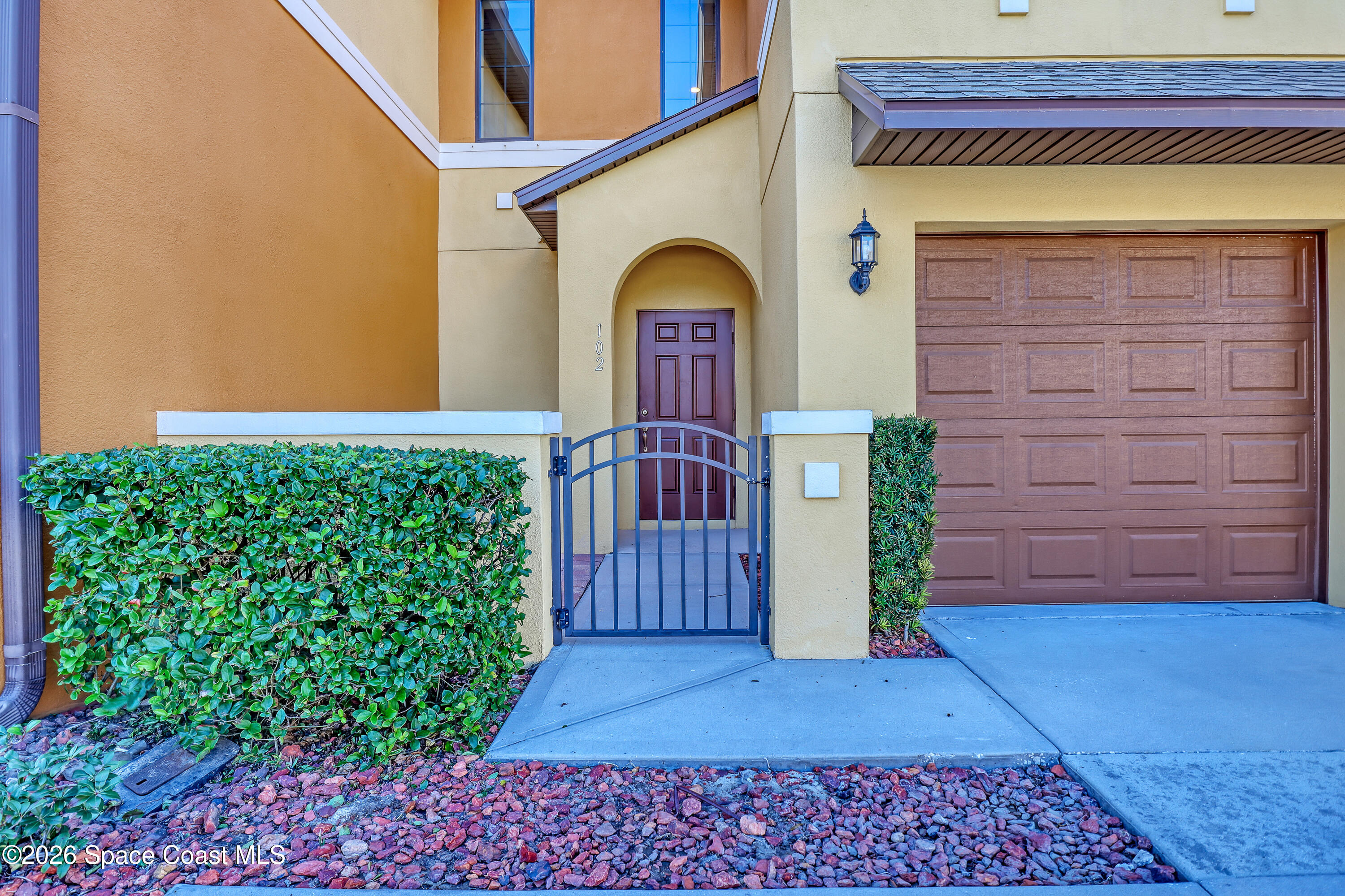 1420 Lara Circle, Unit 102 Rockledge, FL 32955 - Photo 1 of 38 a view of front door of house