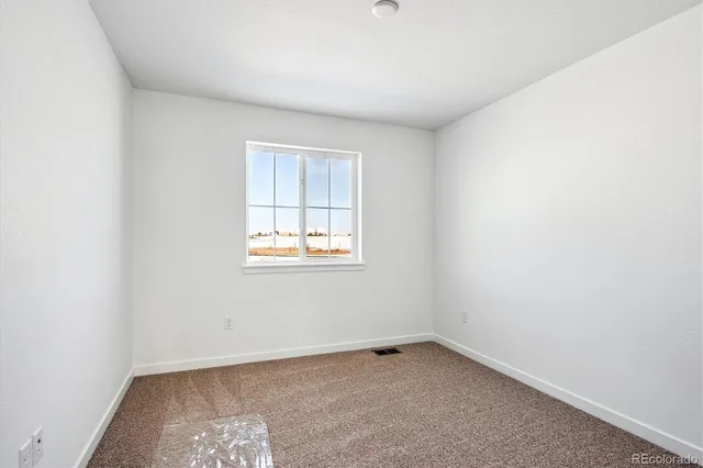 an empty room with a window