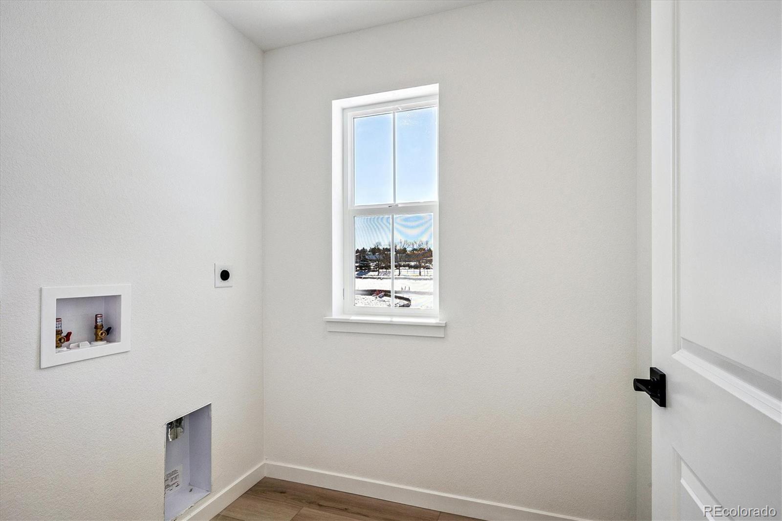 17543 East Virginia Avenue Aurora, CO 80017 - Photo 22 of 26 a view of an empty room