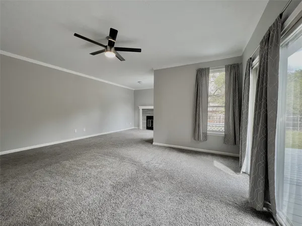 a kitchen with stainless steel appliances white cabinets and a stove
