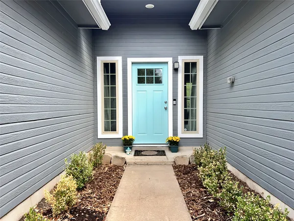 a view of a entryway door front of house