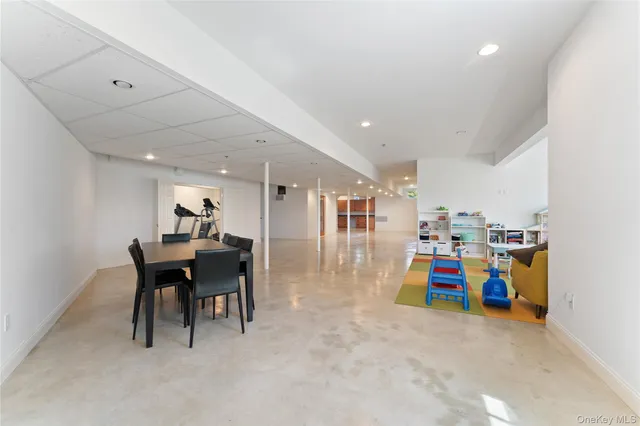 a view of a room with furniture and toys