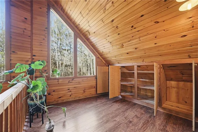 a view of entryway with wooden floor