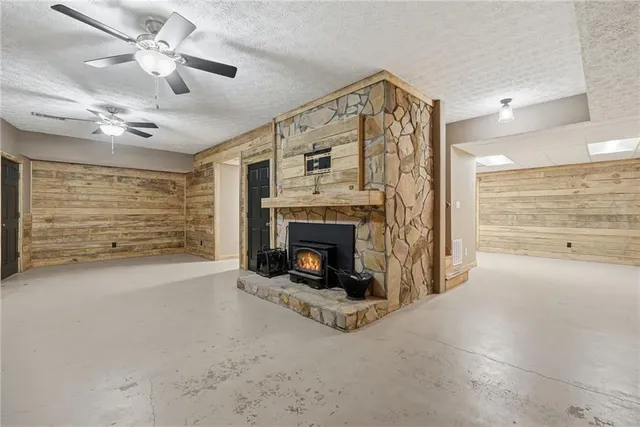 a view of a livingroom with an empty space and fire place