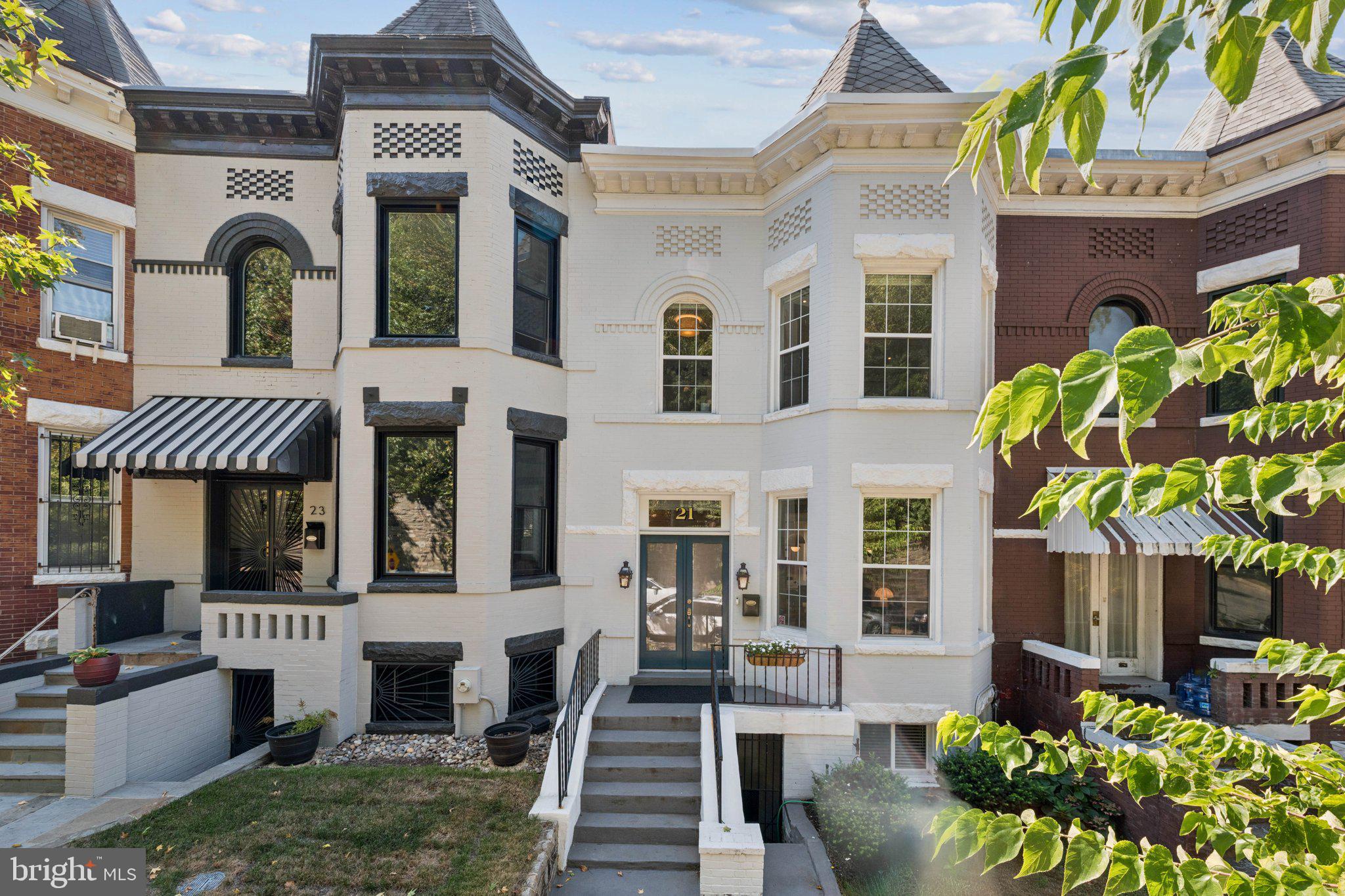 21 V Street Northeast Washington, DC 20002 - Photo 1 of 32 a front view of a house with garden